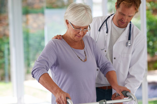 doctor with patient in rehabilitation